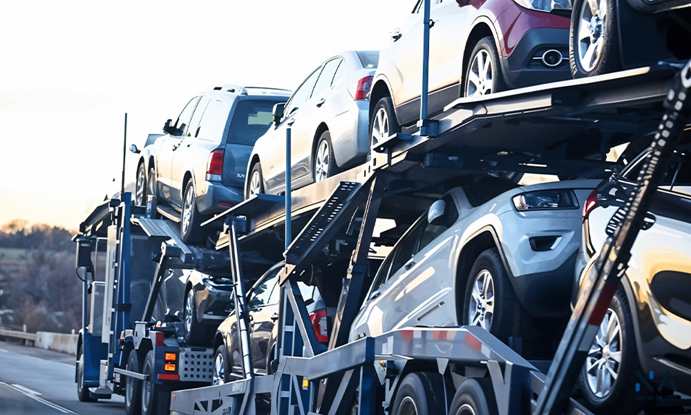Cars loaded on a carrier truck, ready to import a car from Dubai to Venezuela