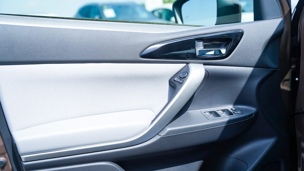 Mitsubishi Eclipse Cross 2026 Bronze Grey Door Panel Interior 1024x576