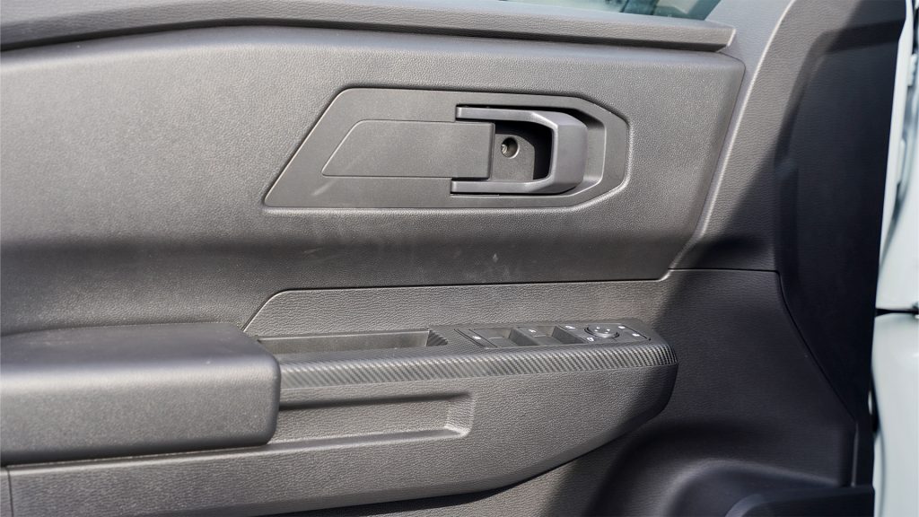 Mitsubishi L200 2026 White Black Door Panel Controls 1024x576