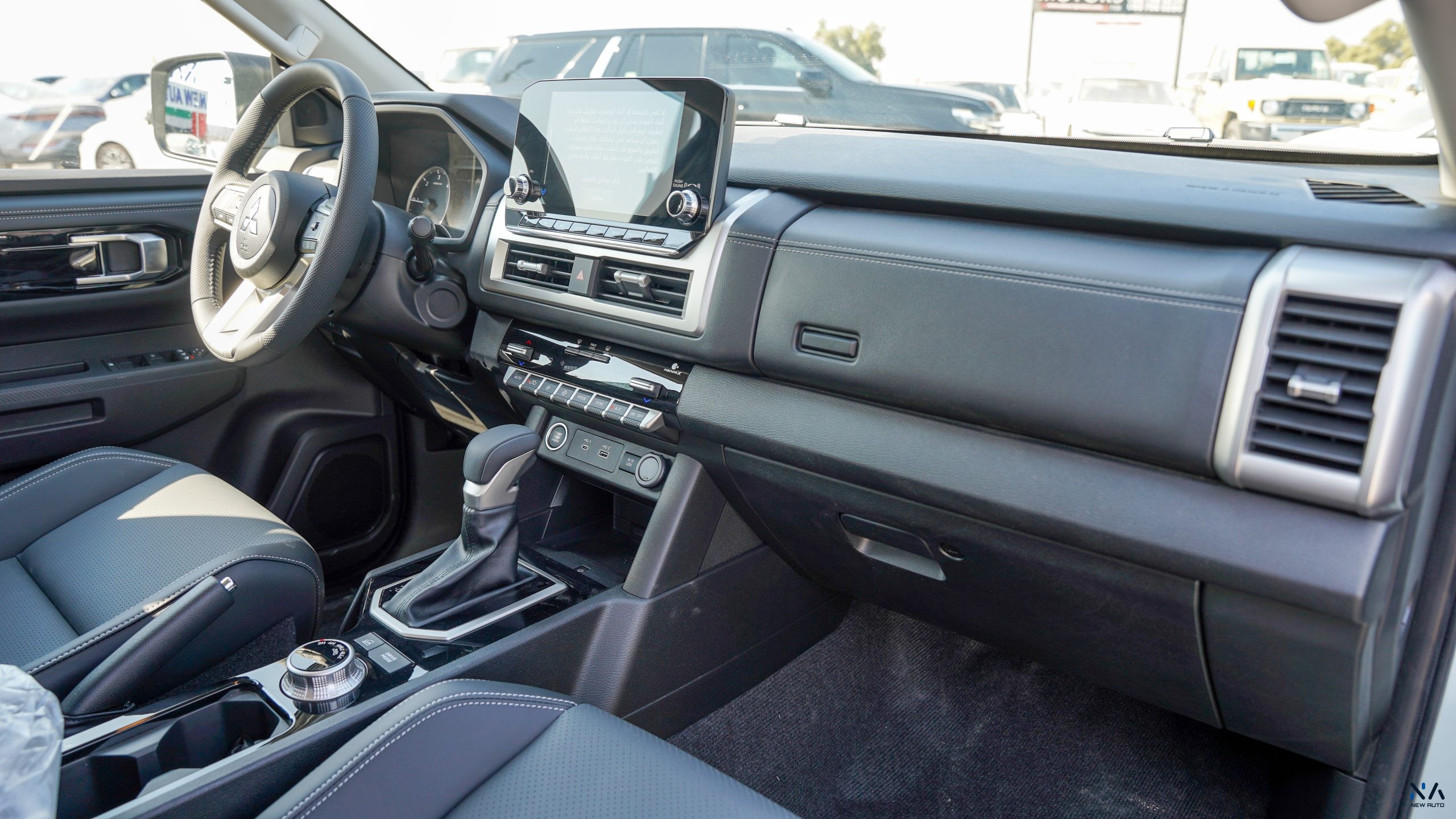 Mitsubishi L200 (C82) – White – Black 2026