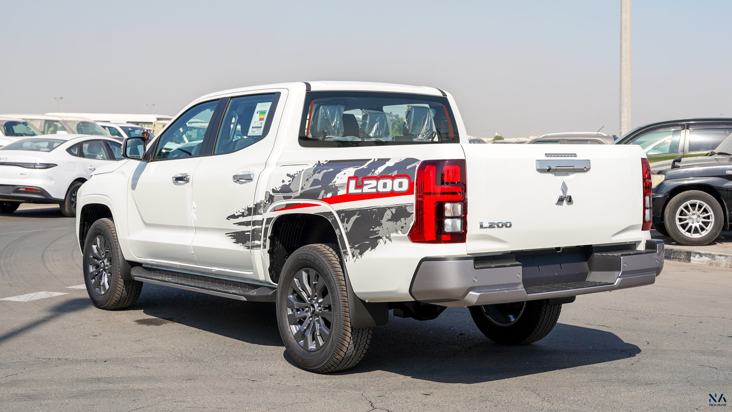 Mitsubishi L200 (C82) – White – Black 2026