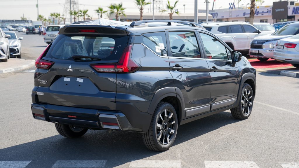 Mitsubishi Premium Xpander Cross 2026 Grey Burgundy Black Rear Side Angle View 1024x576