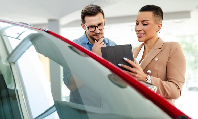Car buyers comparing vehicle options with expert guidance before choosing the right car type