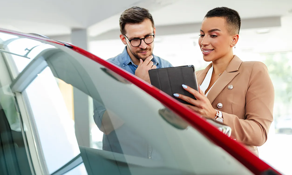 Car buyers comparing vehicle options with expert guidance before choosing the right car type